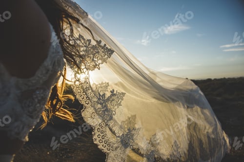 Preview: Bride In The Countryside Playing With The Veil Of Her Dress, Moving It To The Wind To Have Fun.