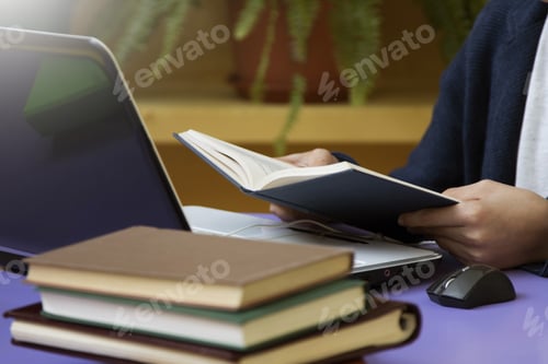 Preview: Student With Books And The Computer