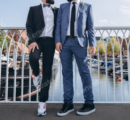 Preview: Same-Sex Marriage, Close Up Of Happy Male Gay Couple Holding Hands Walking In Downtown Of