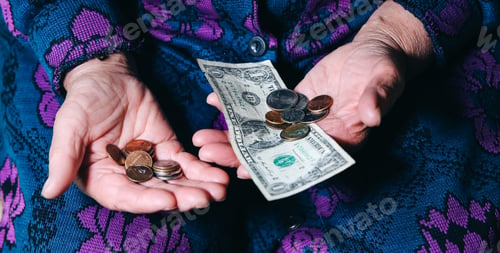 Preview: Old Woman With Very Little Money. Poverty Concept. Pensioner With One Dollar Note And Coins In