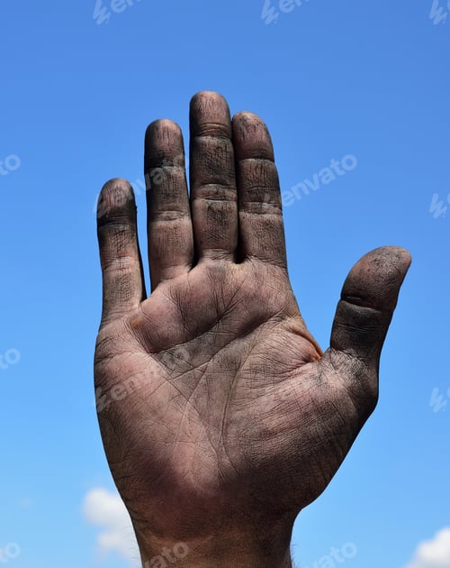 Preview: Open Palm Of A Man'S Right Hand Smeared With Soot Against The Blue Sky