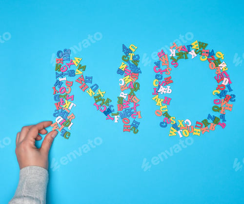 Preview: Word No From Multicolored Small Wooden Letters On A Blue Background, A Female Hand Holds One Figure