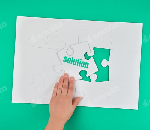 Preview: Female Hand Holding White Puzzle With The Word Solution, Process Of Closing The Missing Element