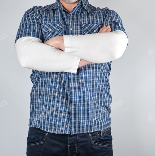Preview: Man In A Blue Plaid Shirt And Jeans Is Standing With Arms Crossed Over His Chest, White Background