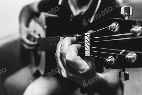 Preview: Man At Home Is Playing The Guitar. Guys Hands Are Taking The Chord On Strings. Music Making