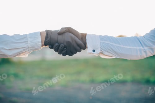 Preview: Two Men Clapping Hands In Protective Gloves. Doctors Wearing Medical Gloves On Hands Celebrating