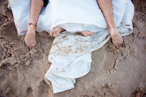 Preview: Bare Feet Of A Bride With Her Messy Dress On The Beach.