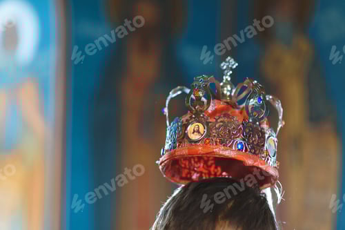 Preview: Red Crown Over Head Of Groom At Church Ceremony