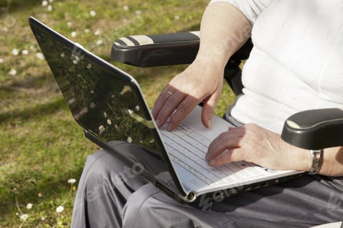 Preview: Senior Woman With Computer Outdoors