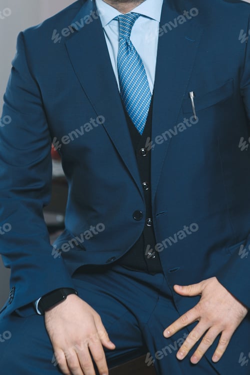 Preview: Businessman In Blue Suit At Office