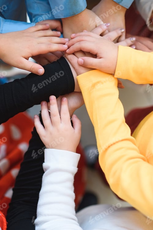 Preview: Group Of Children Holding Hands Together