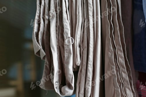 Preview: Plastic Button On The Gray Fabric Close Up