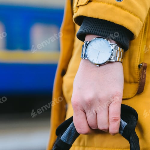 Preview: Woman Hold Bag On Railway Station. Watch On Wrist.