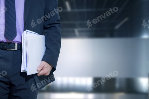 Preview: Man Of Business With The Papers In Her Hand