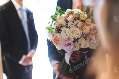 Preview: Groom Holding Wedding Rose Bouquet