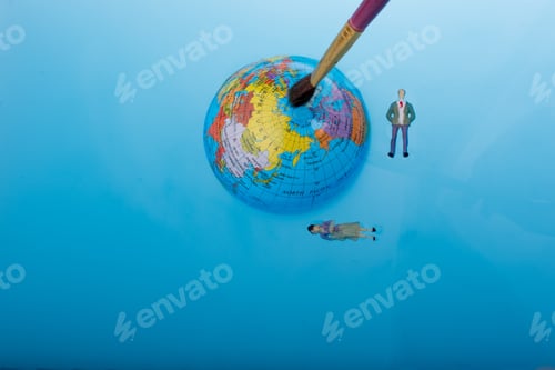 Preview: Brush And Little Globe With Floating Figurines Around In Water