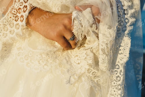 Preview: Bride Preparing For Her Wedding, Putting On The Garter And Lingerie
