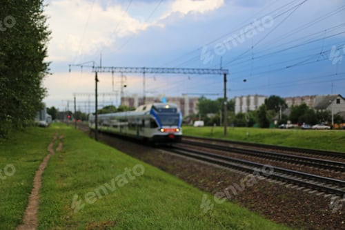 Preview: Blurred Train Riding On The Rails