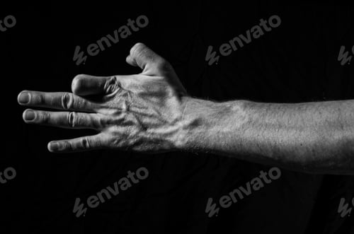 Preview: Black And White Image Of The Hands Of Two People
