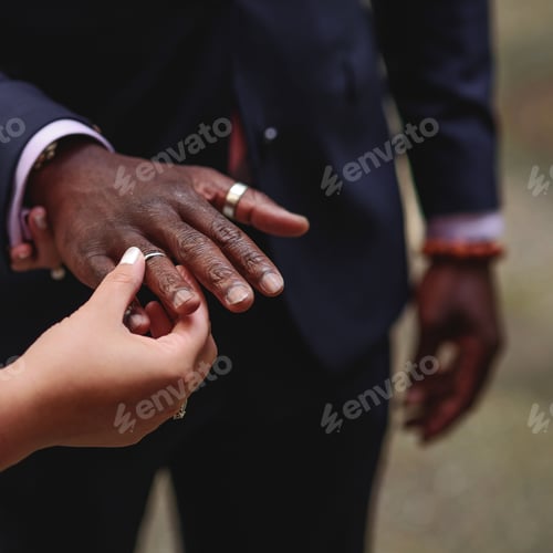 Preview: Bride Putting On The Ring On Her Future Husband. Marriage Ceremony