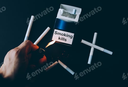 Preview: Smoking Kills Sign On The Pack Of Cigarettes. Dangerous Habit. Harmful For Health. Man Holds