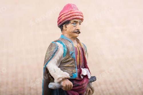 Preview: Turkish Ottoman Man Figurine In View On A Brown Backgorund