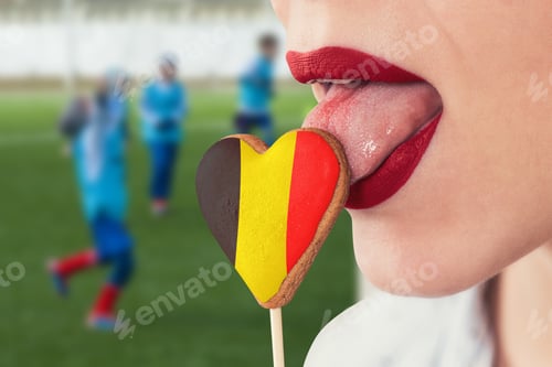 Preview: Closeup Photo Of The Woman Lips And Cookie Hearts With Flag Of Belgium