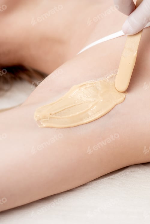 Preview: Depilation And Epilation Female Armpit With Liquid Sugar Paste By Spatula. Hand Of Cosmetologist