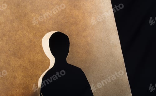 Preview: Man Shape Cut Out Of Paper In Hand In The View