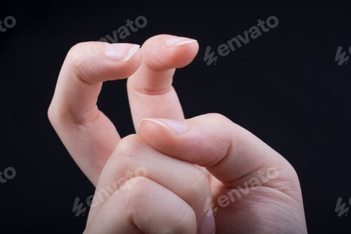Preview: Human Hand In View On A Black Background