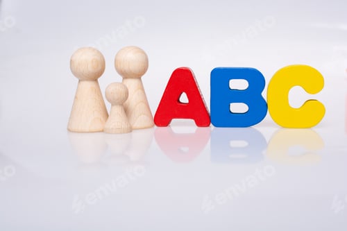 Preview: Wooden Figurines Of Family As Concept Of Caring For Children