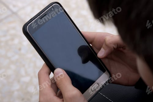 Preview: Closeup Of Child With Mobile Phone