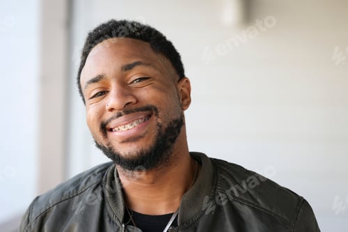 Preview: A Close Up Shot Of A Fashionable African American Man Living With Hiv Smiling At Camera Wearing