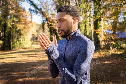 Preview: A Side Profile Shot Of An African American Man Living With Hiv Wearing Sportswear In The Park