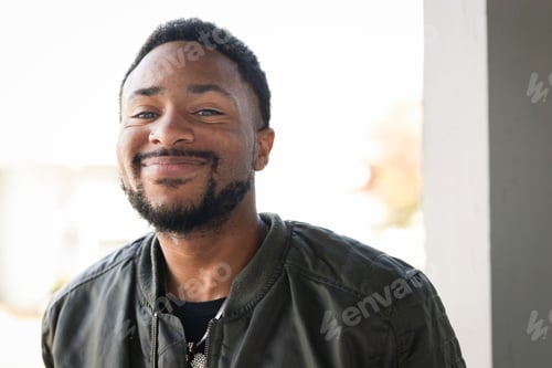 Preview: A Close Up Shot Of A Happy Fashionable African American Man Living With Hiv Looking At Camera