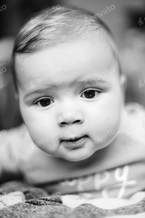Preview: Baby Boy At Home. Close Up Portrait .Black And White
