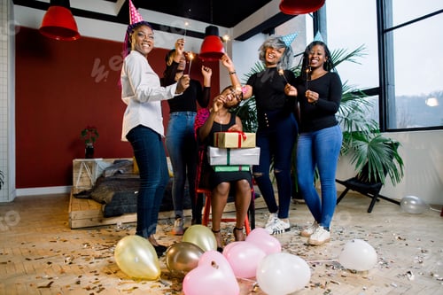 Preview: African Friends Celebrate Birthday And Holding Bengal Lights And With Hats And Gifts