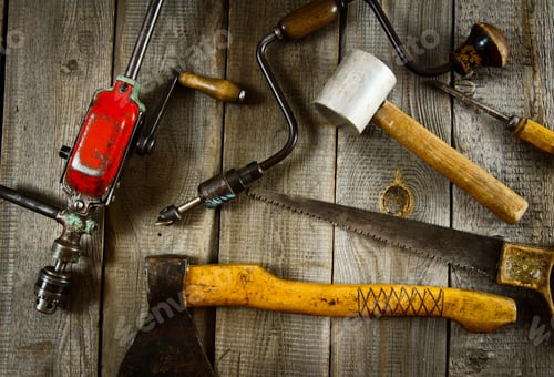 Preview: Old Working Tools. Various Tools On A Wooden Background.