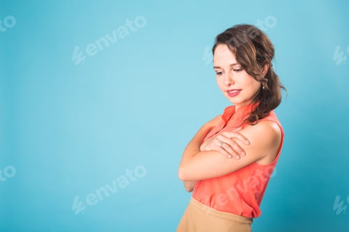 Preview: Beautiful Happy Smiling Teen Girl Over Blue Background With Copyspace