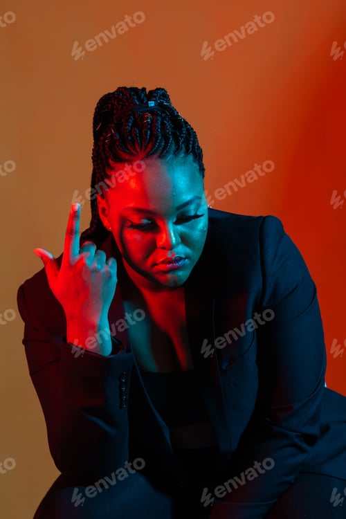 Preview: Close Up Beauty Fashion Portrait Of An Attractive Young African Woman Wearing Dreadlocks Over
