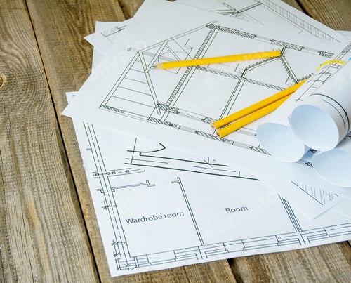Preview: We Build A Building. House Construction. Many Drawings For Building And Pencils On Old Wooden