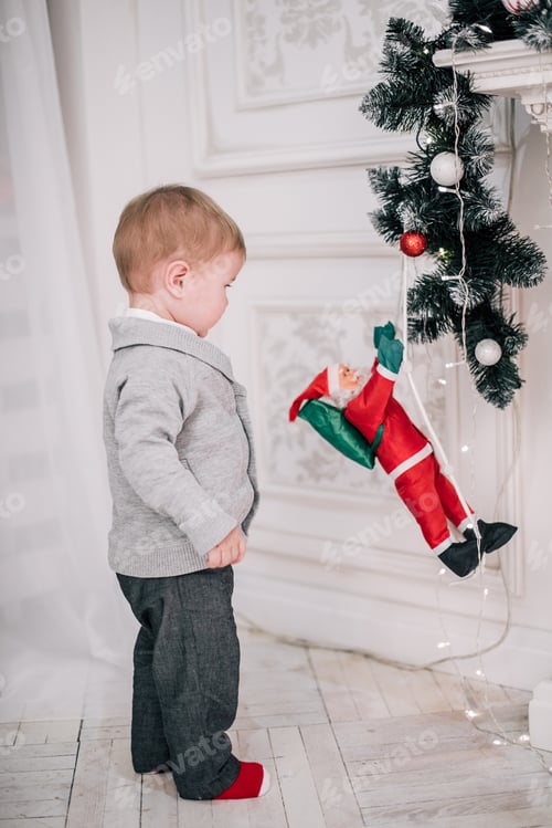 Preview: Christmas Portrait Of A Young Boy Cozy Atmosphere Around The Fireplace And Christmas Tree