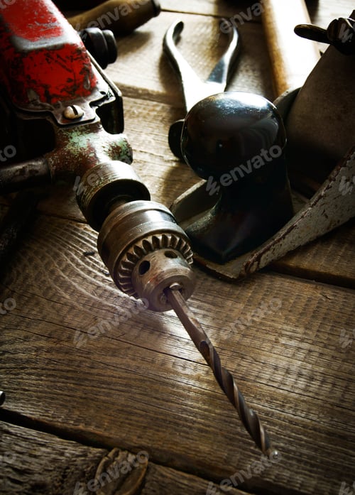 Preview: Vintage Drill and Other Tools on Rustic Wood