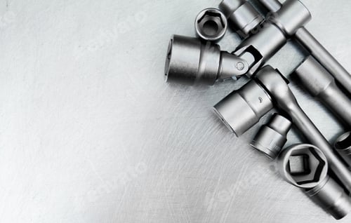 Preview: Metal Tools. Wrench With A Set Of Heads On The Scratched Metal Background.