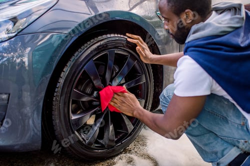 Preview: Car Washing And Detailing Photo, Car Wash Outdoors. Cropped Image Of Young African Man, Washing