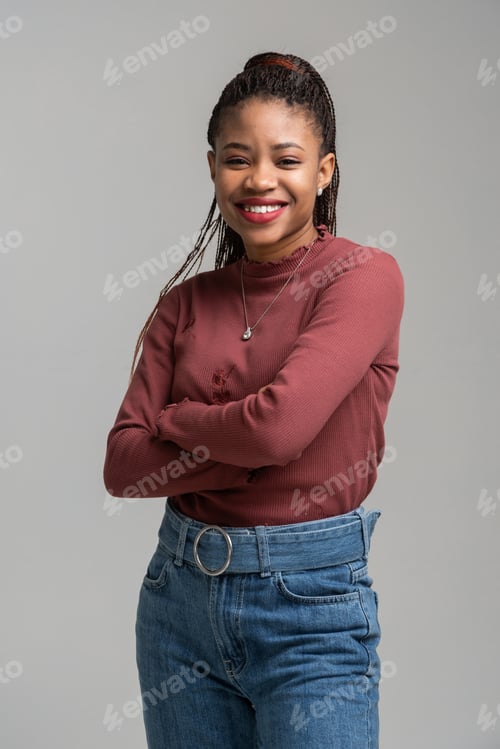 Preview: Portrait Of Beautiful African American Girl Standing With Bent Hands