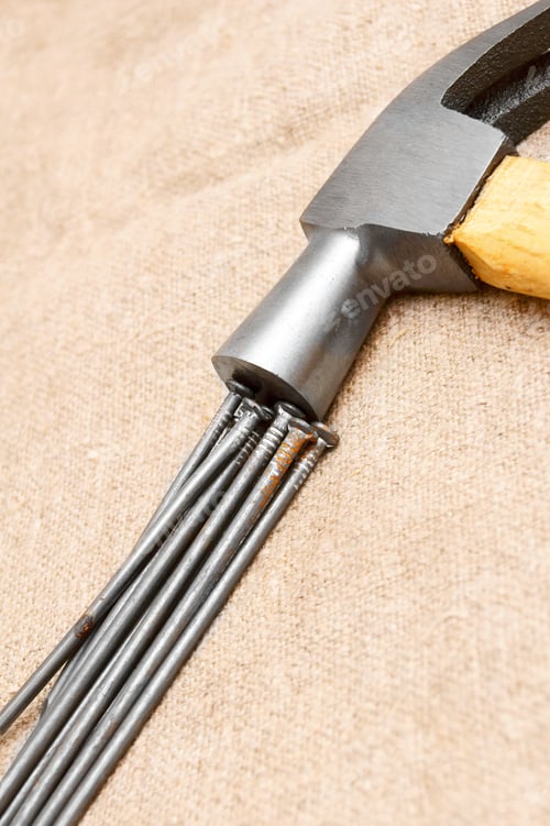 Preview: Hammer, Nails On A Fabric.