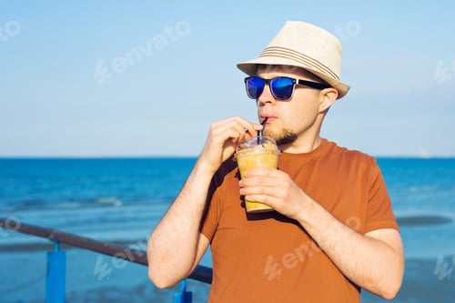 Preview: Man With Coffee Frappe Near Sea Feeling Free Enjoying Freetime Vacations