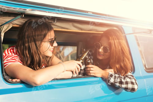 Preview: Summer Holidays, Road Trip, Vacation, Travel And People Concept - Smiling Young Hippie Women In Car
