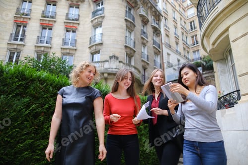 Preview: International Student S With Papers Learning English Near University Building In . Concept Of